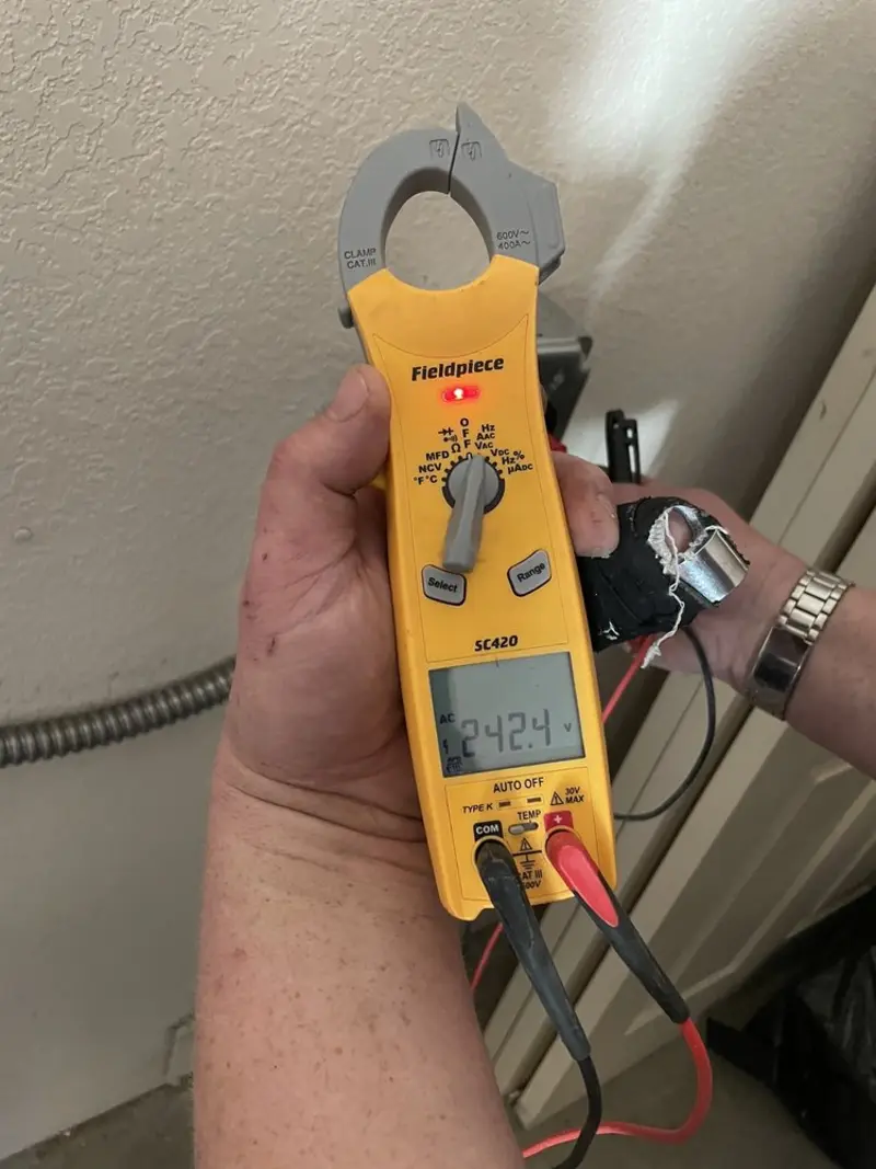 Voltage testing with clamp meter during Aluminum Wiring Replacement in Sugar Grove
